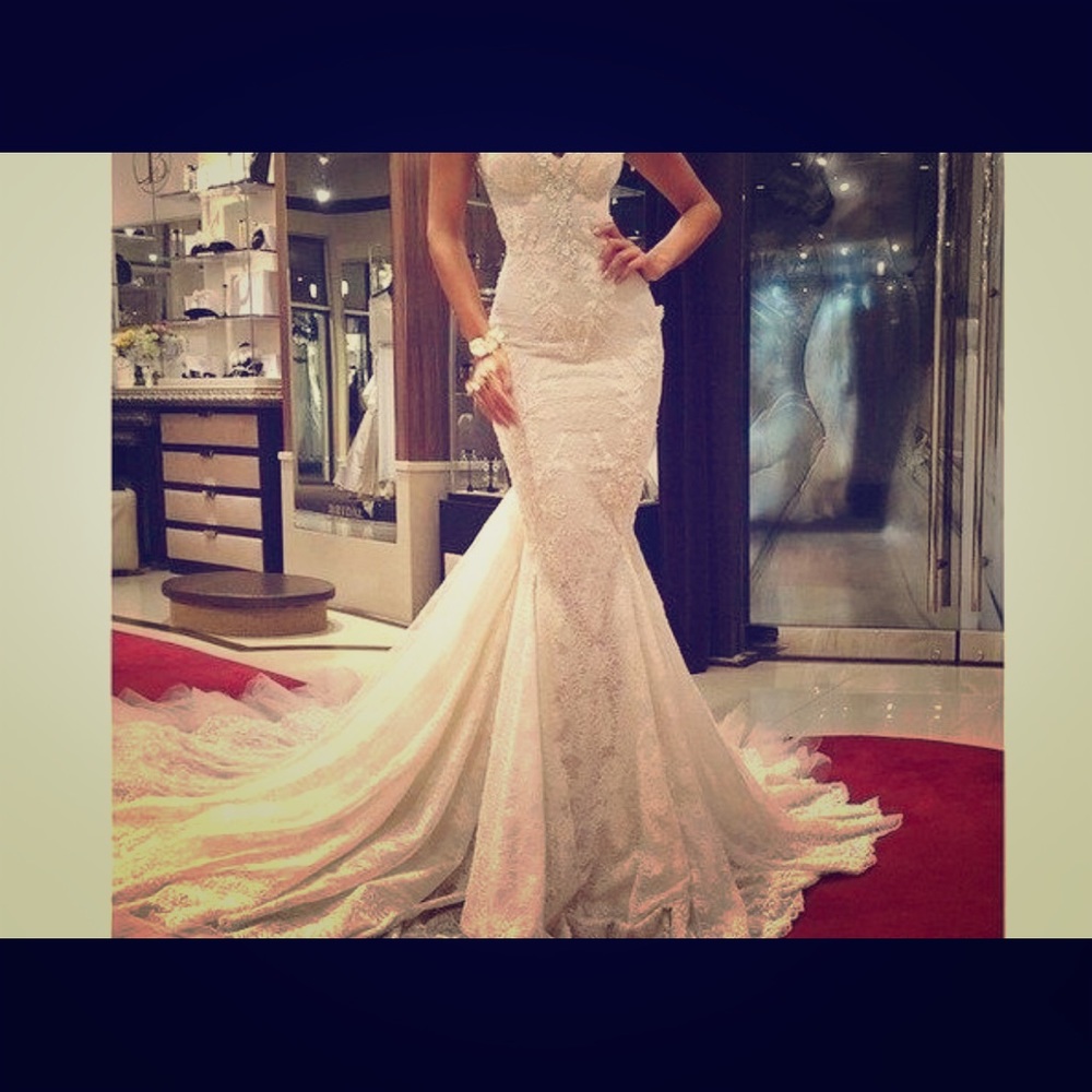 White mermaid style lace with long train